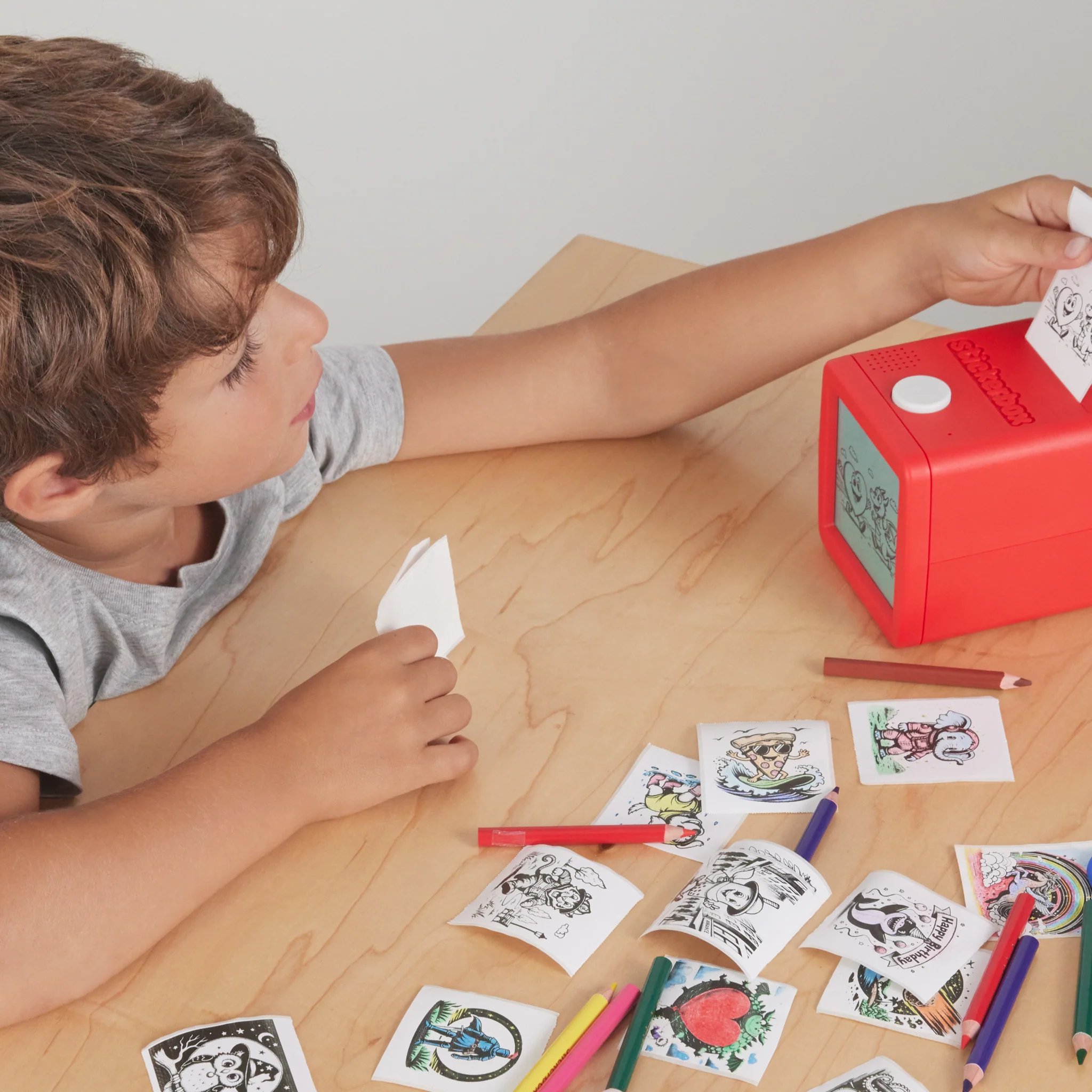 Boy Printing Stickers